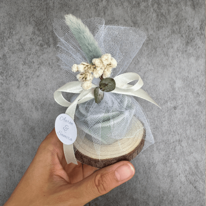 wedding gift candle on a wooden tray