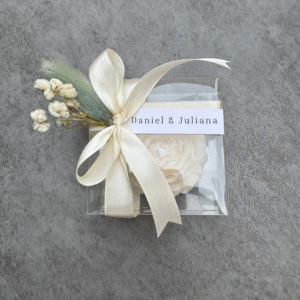 wedding white peony candle in transparent box with baby breath decor