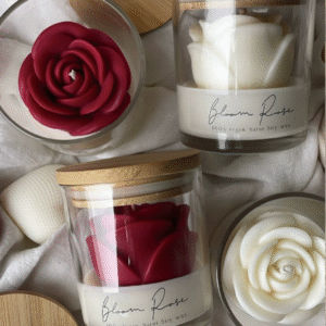 favours gift to the guests rose candle in white and red colours